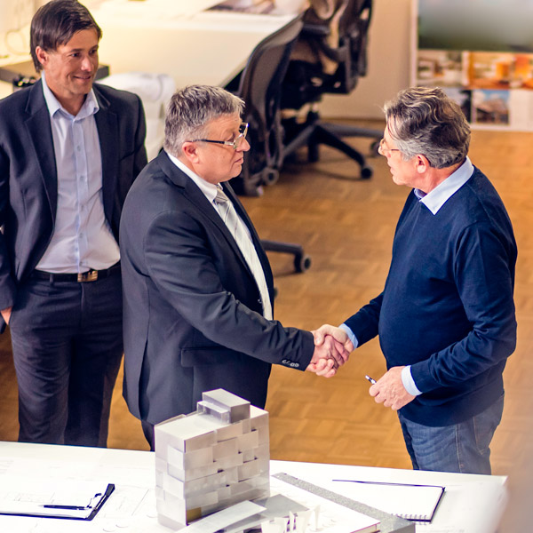 business men shaking hands